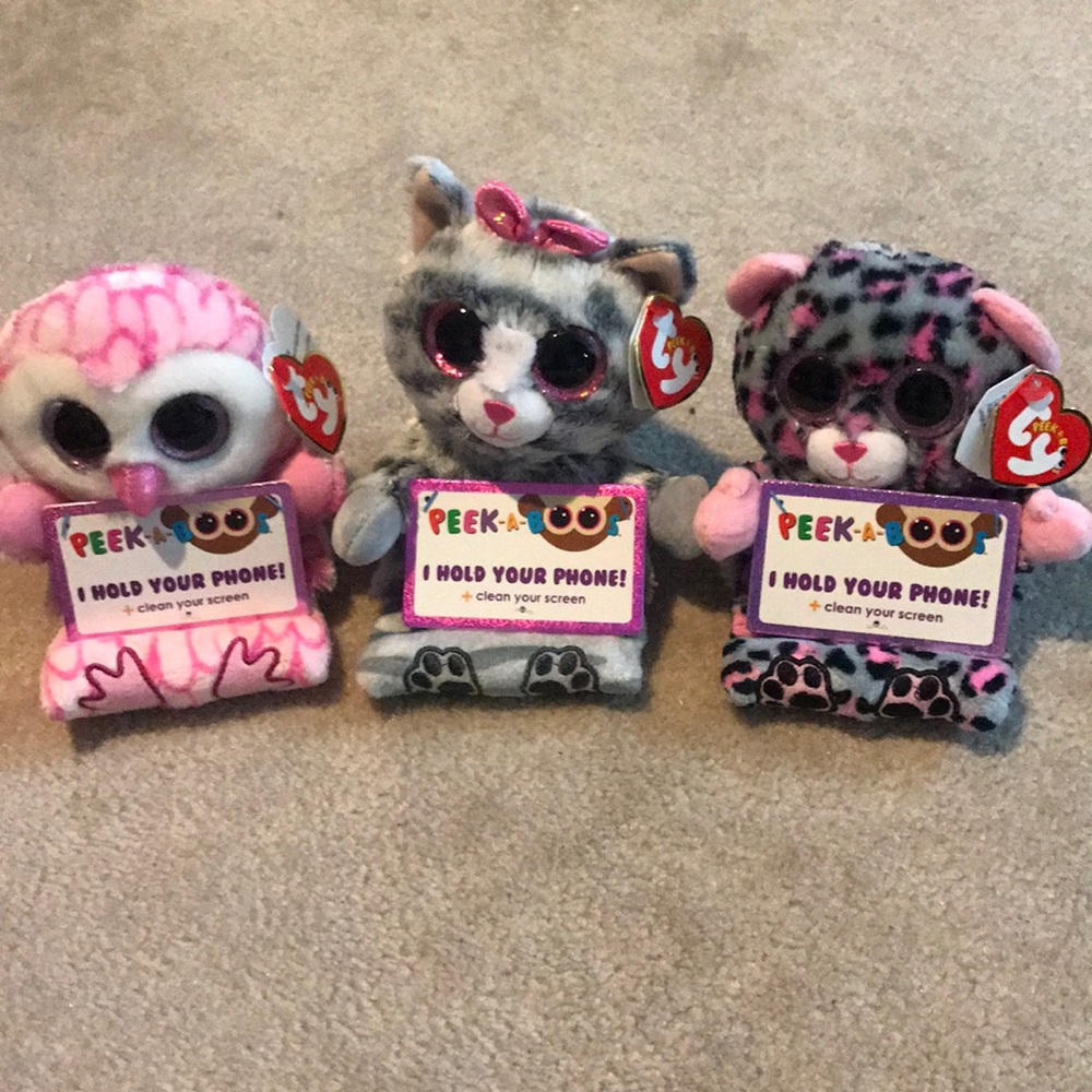 SOLD-NWT bundle peek a boo collection phone holder